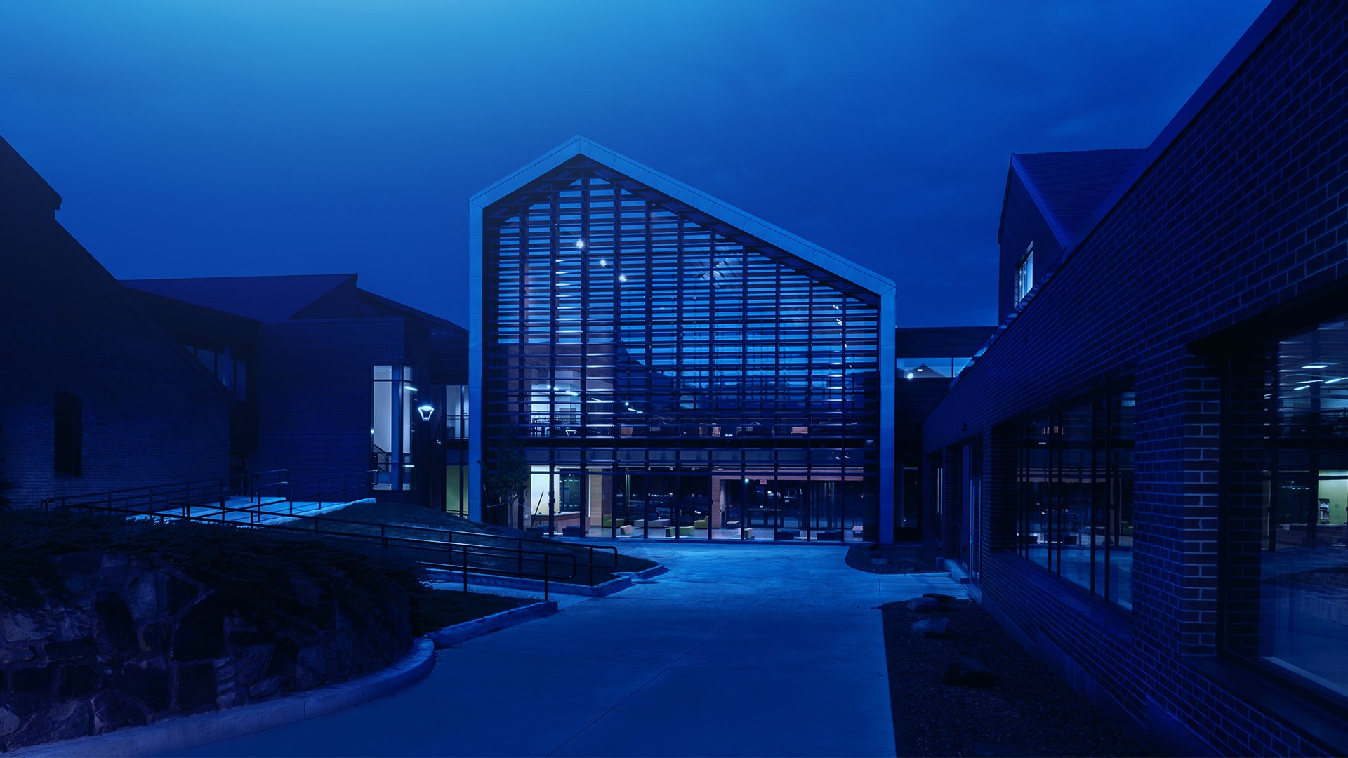 night time exterior of college in blue light